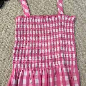 Pink checkered top.